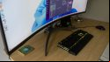 A close-up of the The AOC Agon AG493UCX2 monitor to show its curvature